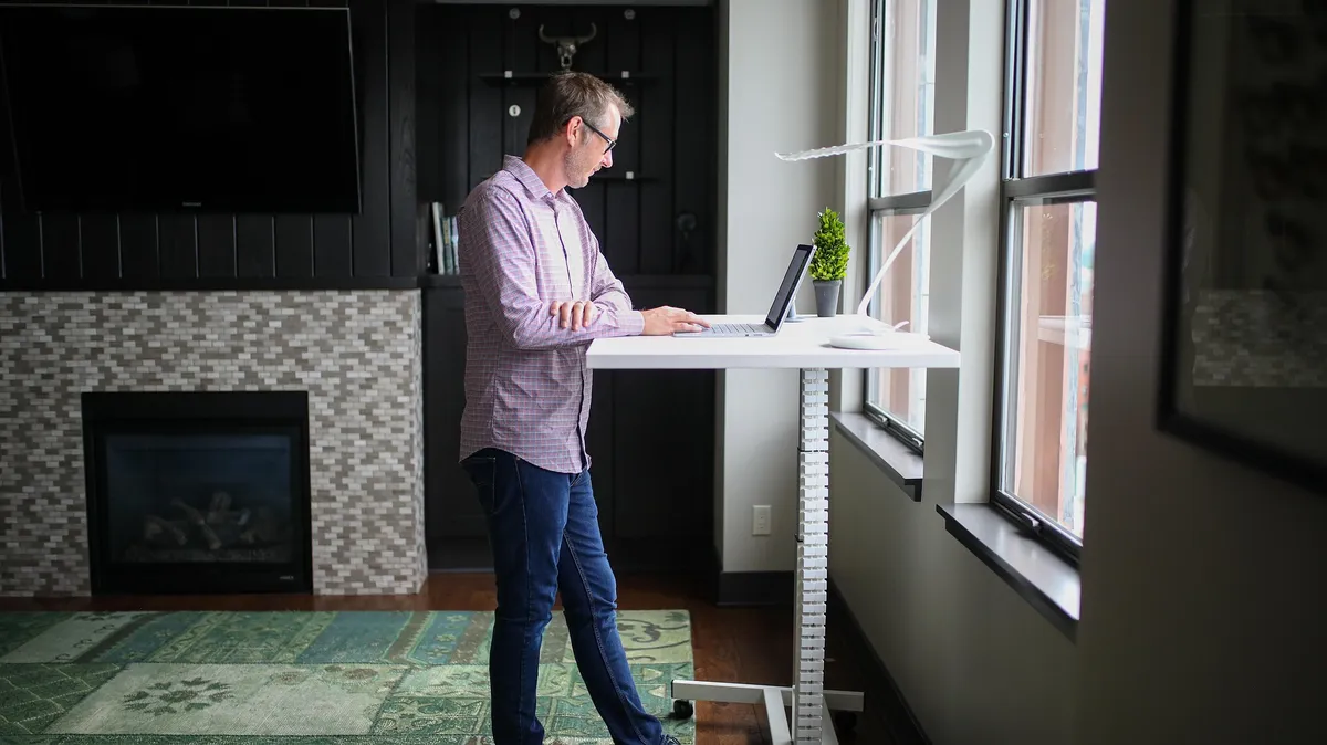 Person walking outdoors during a break from working from home